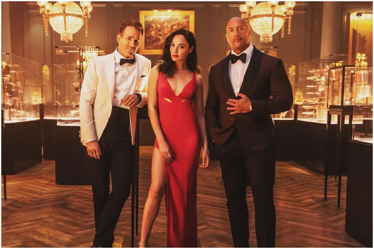 (L-R) Nolan Booth (Ryan Reynolds), The Bishop (Gal Gadot) und John Hartley (Dwayne Johnson)